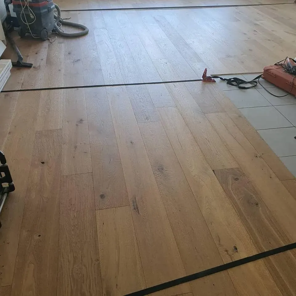 Pose d'un parquet contrecollé Lamett à Strasbourg (2webp