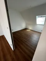 Pose d'un stratifié à Oberschaeffolsheim