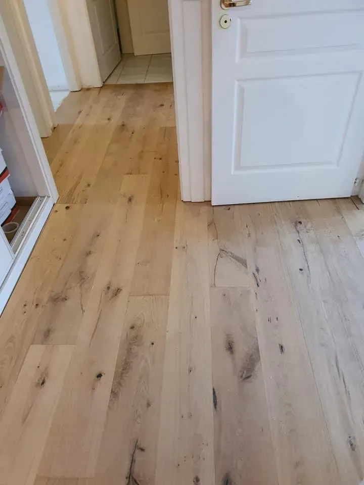 Pose d’un parquet contrecollé chêne brossé vernis dans le quartier de l’Orangerie à Strasbowebp