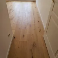Pose d’un parquet contrecollé chêne brossé vernis dans le quartier de l’Orangerie à Strasbowebp