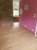 Pose d'un stratifié à Sparbach