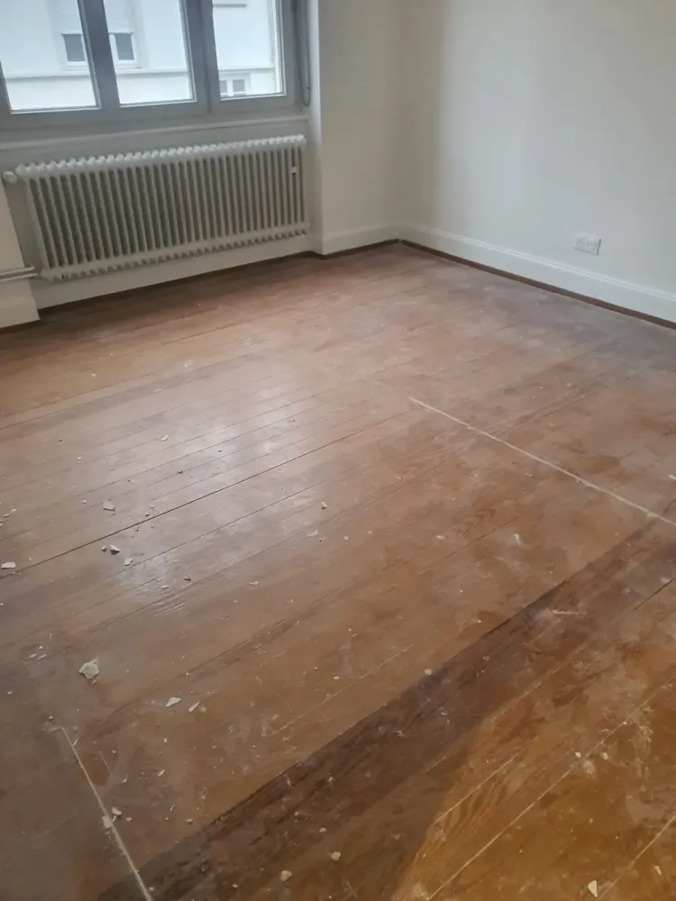 Ponçage d'un ancien parquet à Strasbourg