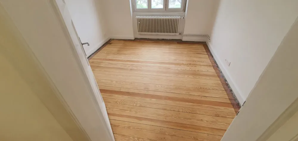 Ponçage d'un ancien parquet à Strasbourg
