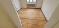 Ponçage d'un ancien parquet à Strasbourg