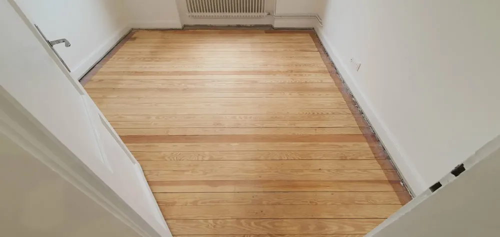 Ponçage d'un ancien parquet à Strasbourg