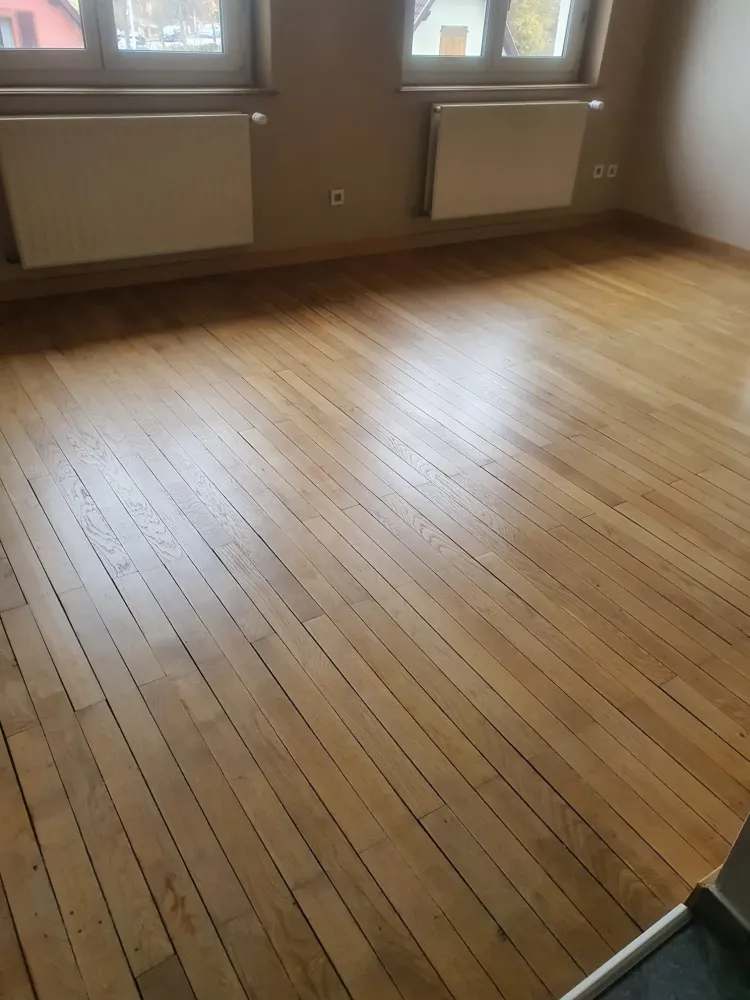 Ponçage d'un parquet & pose de plinthes à Strasbourg